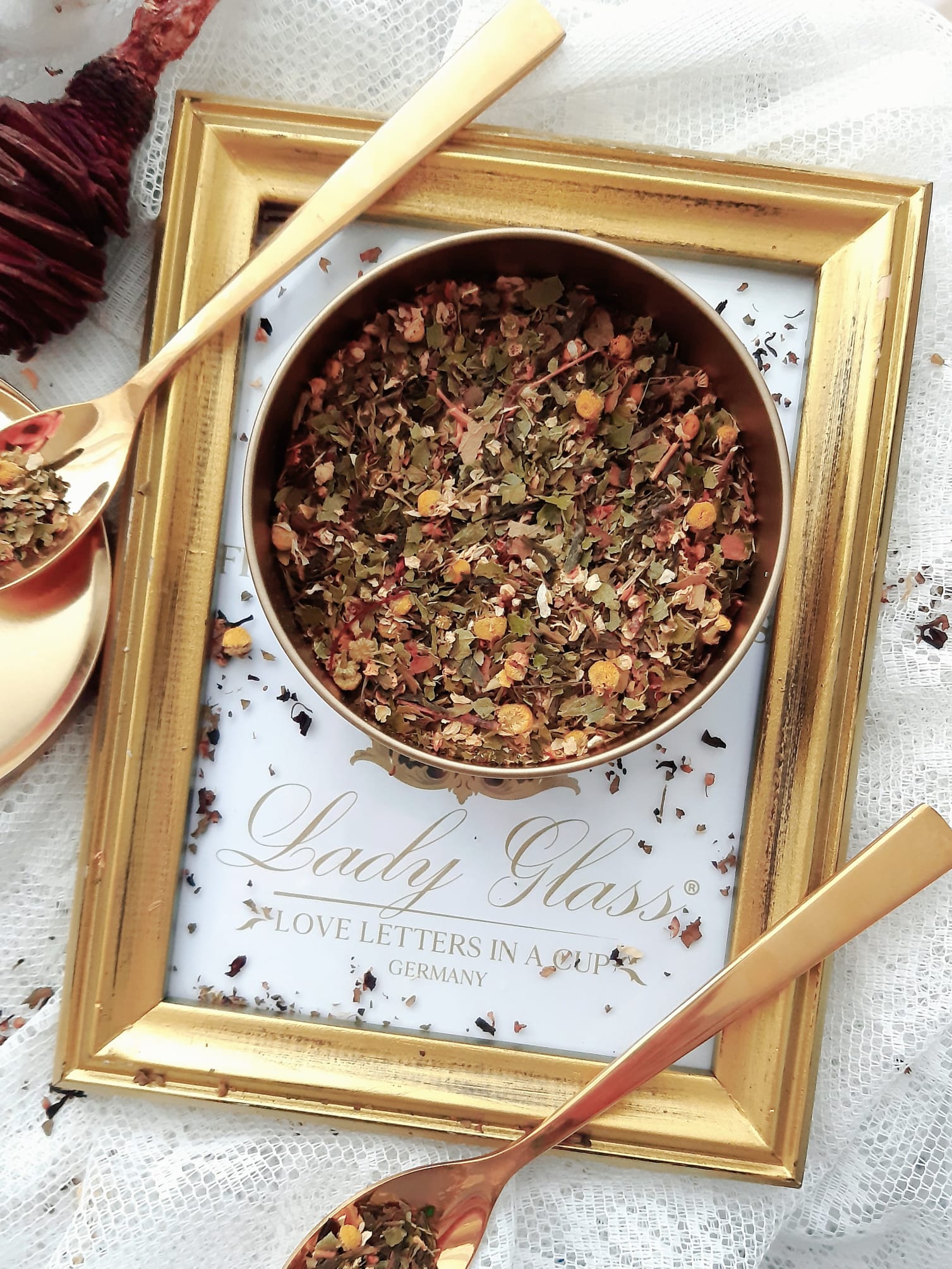 Premium loose leaf Hawthorn and Chamomile grief healing tea in a gold tin