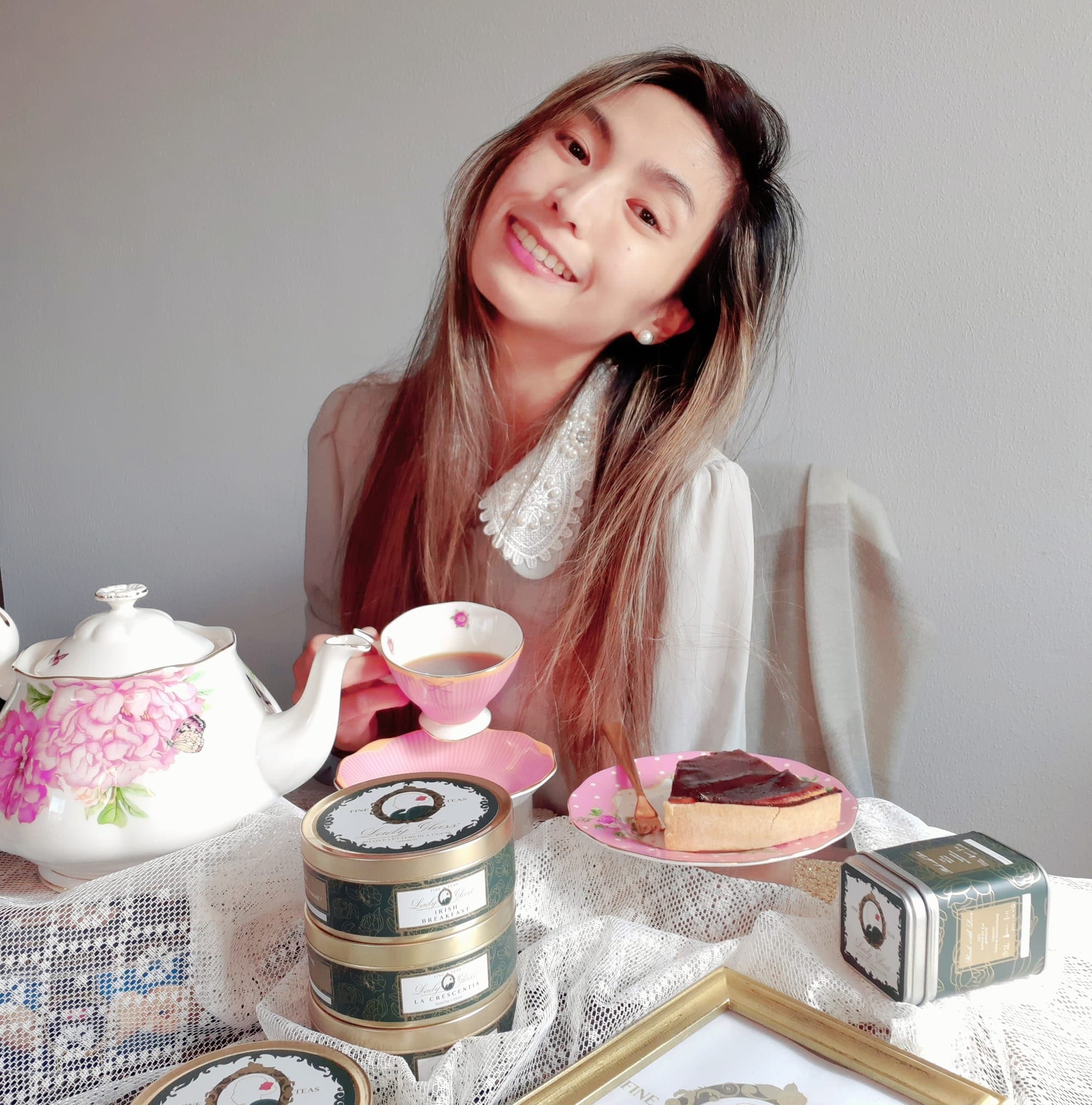 A woman drinking tea teaching mindfulness meditations
